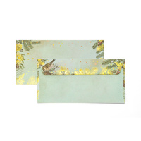 Koperty ozdobne DL Millenium złote święta 10 sztuk 120g